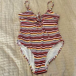 One piece swimming suit. Size M